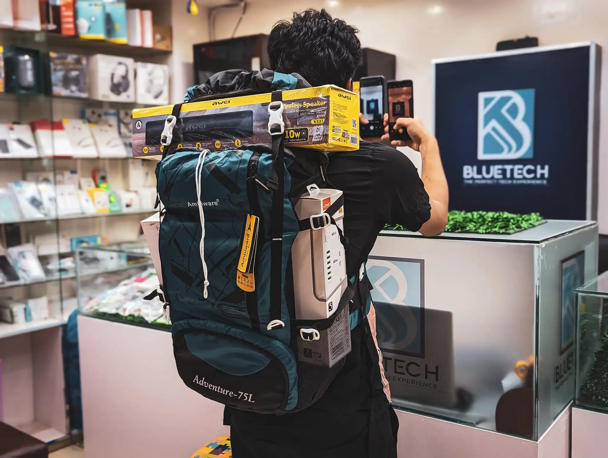 Adventure backpack loaded with tech gear from behind