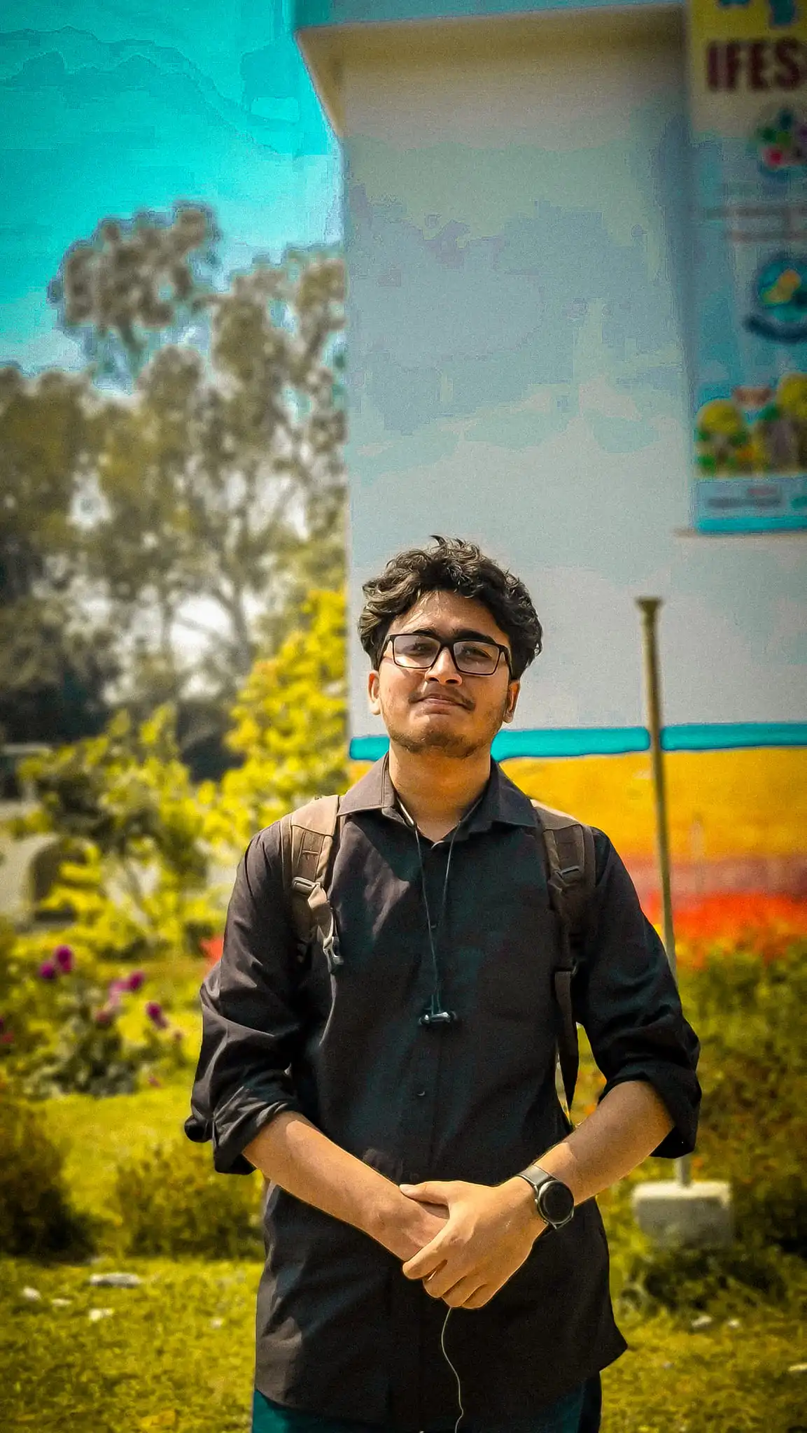 Asibur Rahman on university campus, looking upward toward possibilities